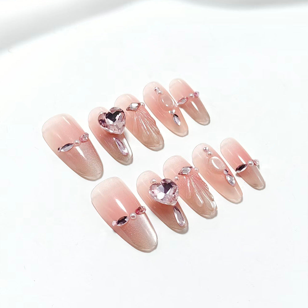 Artificial nails with sparkling heart and rhinestone accents Stornfield