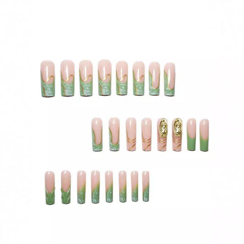 Artistic Press-On Nail Extensions with Gold Detailing Stornfield