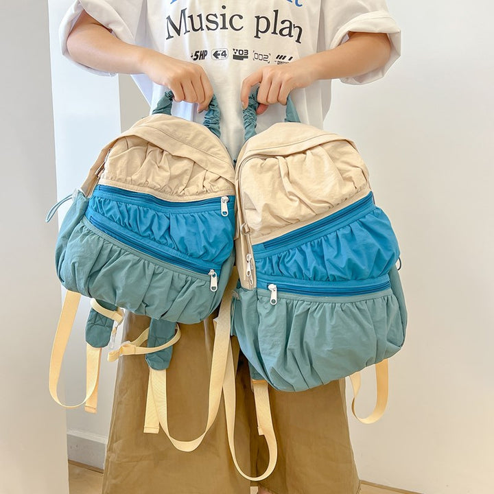Backpack with Innovative, Versatile Compartment System and Elastic Design Stornfield