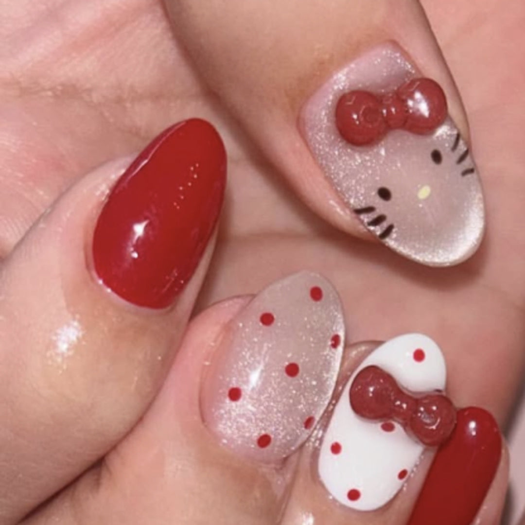 Artificial nail art with playful dots and bows Stornfield