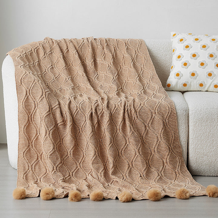 Ladies knit blanket with decorative pom poms Stornfield