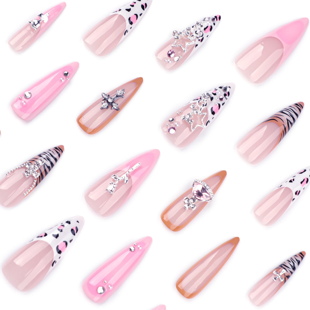 Artful stiletto nails with glitter and rhinestone embellishments Stornfield