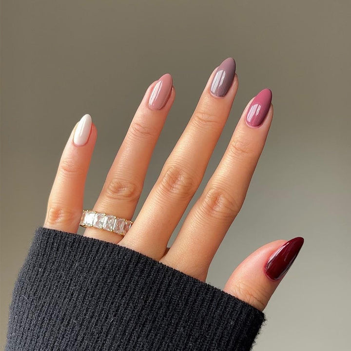 Artful nail extensions with an elegant leaf pattern Stornfield