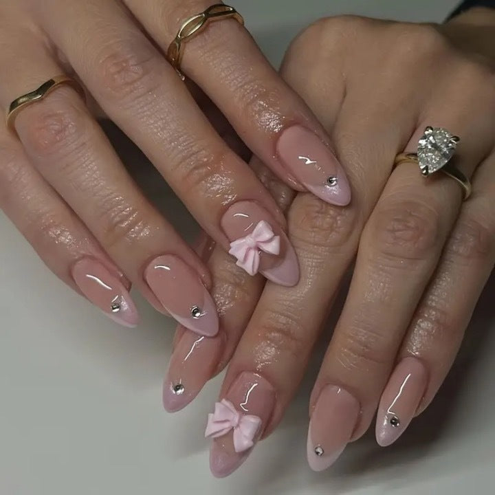 Glamorous nail art with bow detail Stornfield