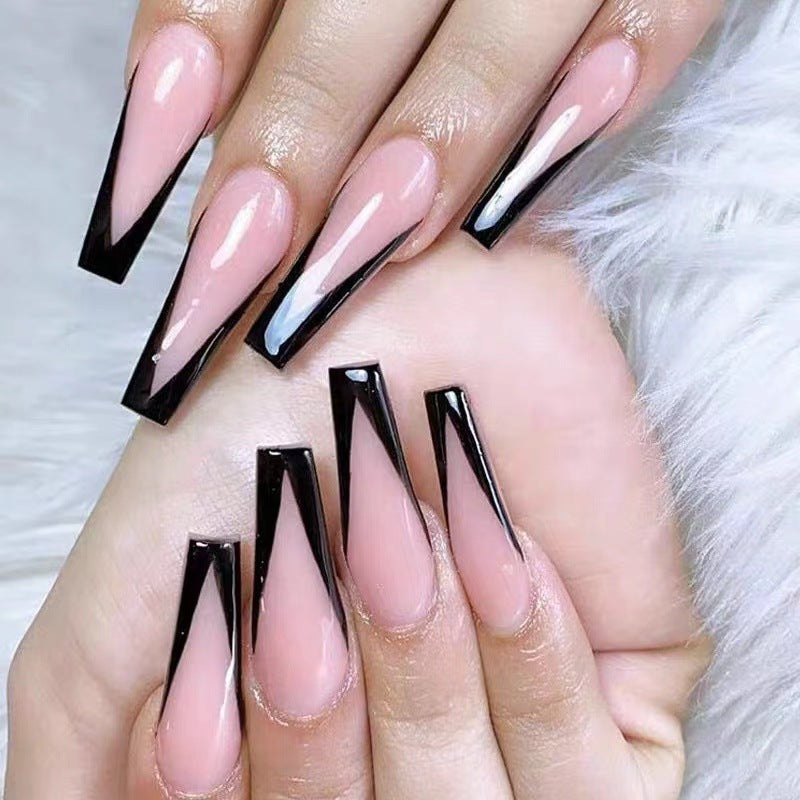 Artificial nail set with elegant stiletto design and glossy accents Stornfield