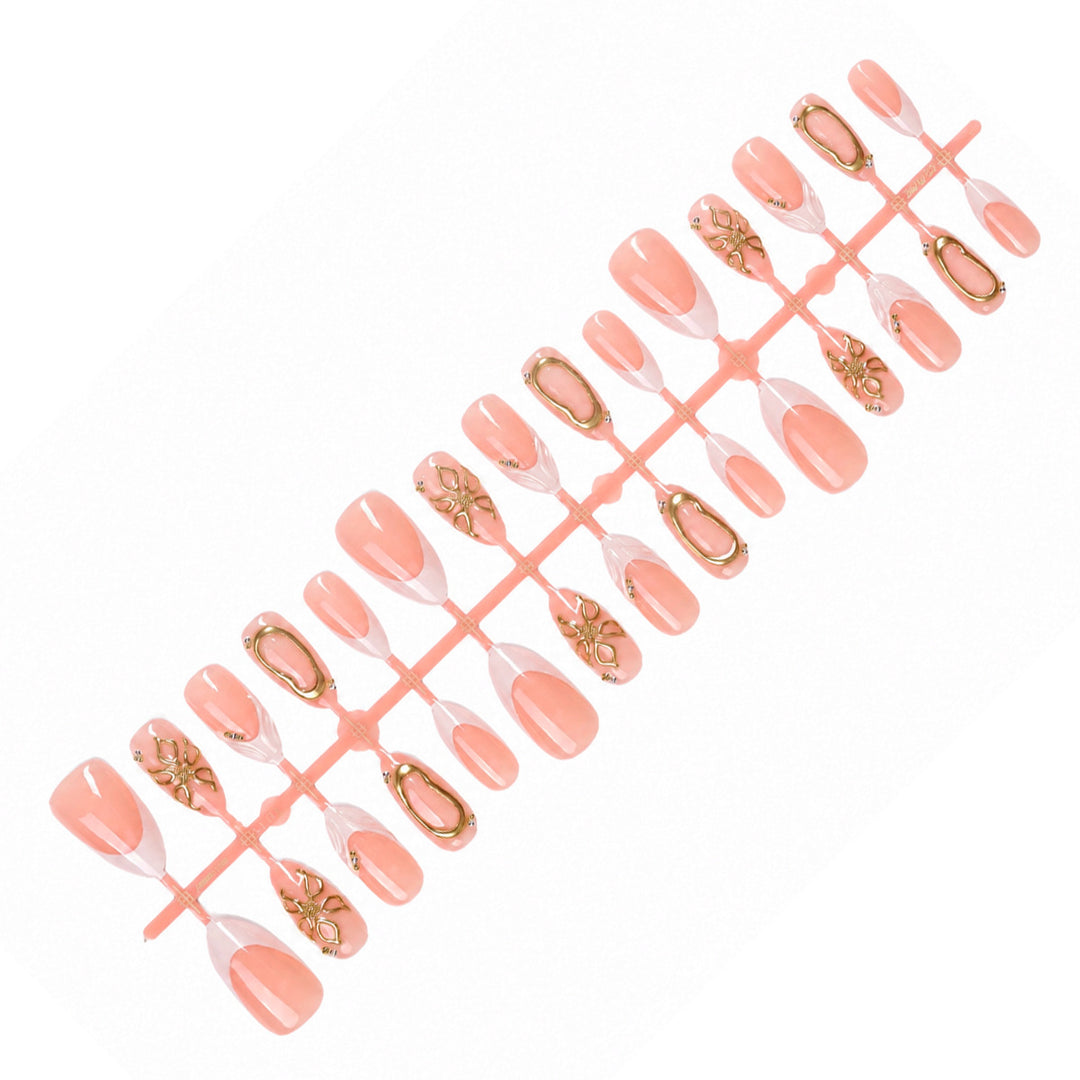 Elegant artificial nails with luxurious golden decorations Stornfield