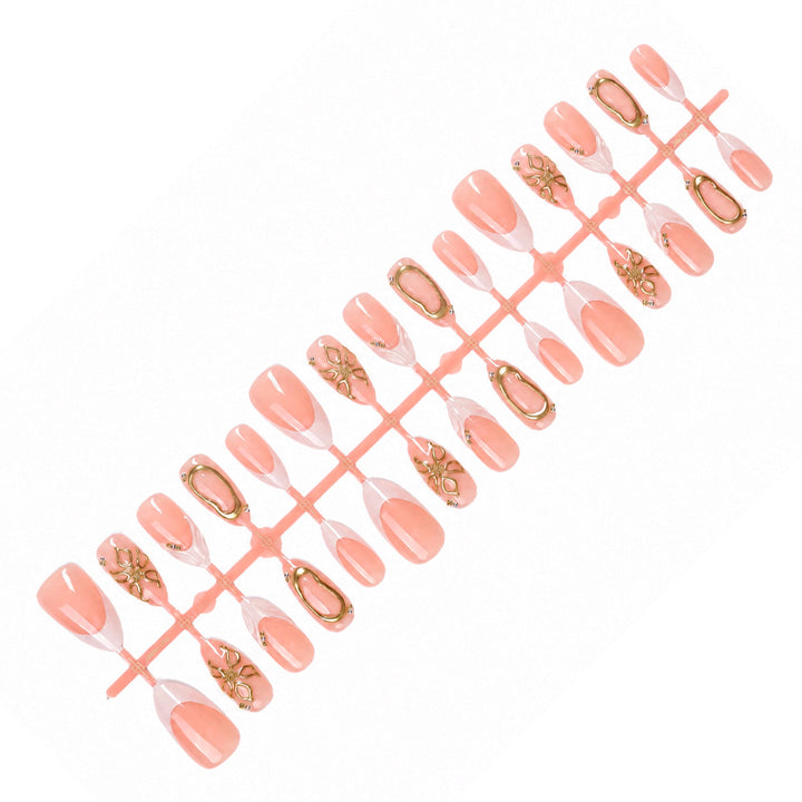 Elegant artificial nails with luxurious golden decorations Stornfield