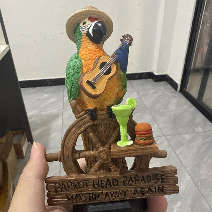 Decorative figure of a funny parrot with drink and guitar Stornfield