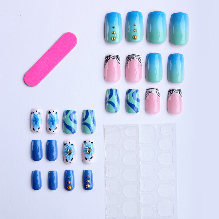 Artificial fingernails with handcrafted designs Stornfield