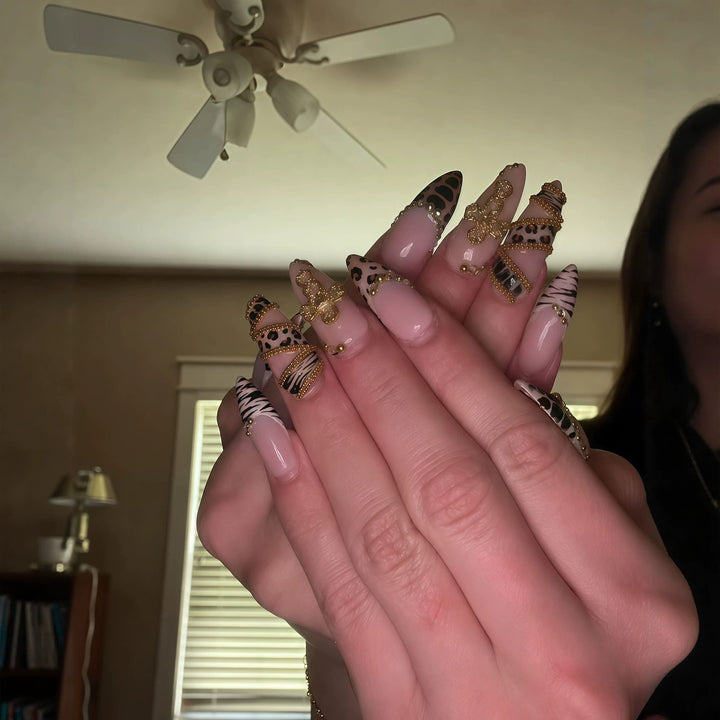 Artistic Stiletto Nail Enhancements with 3D Accents Stornfield