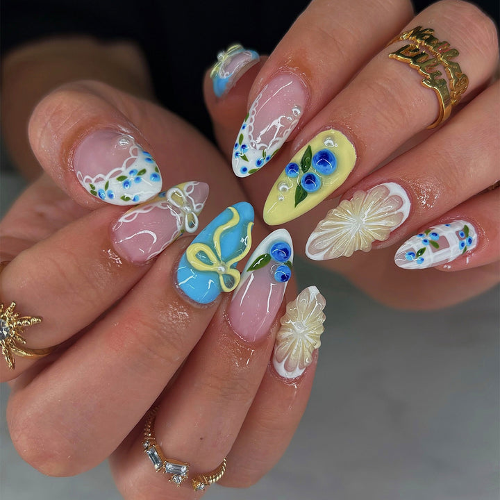Artistic Press-On Nail Art Set with Floral and Bow Designs Stornfield