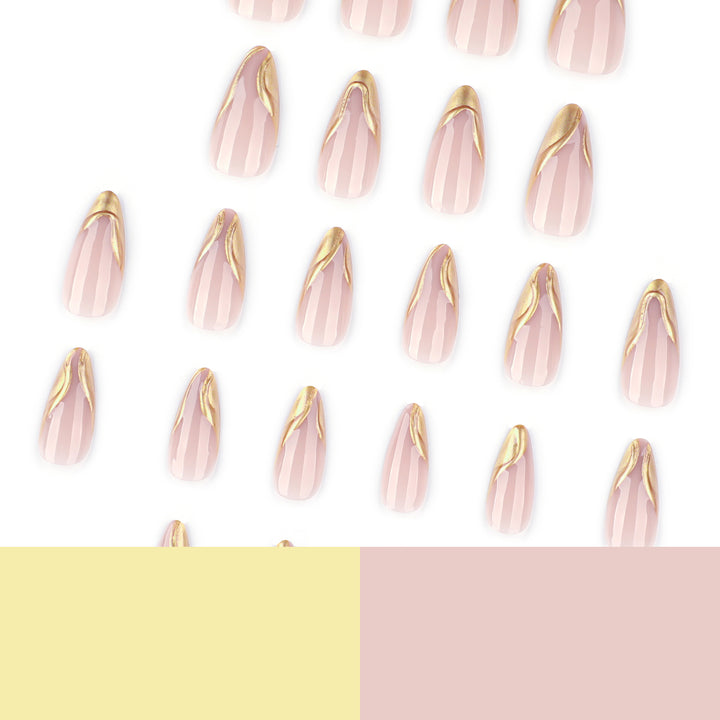 Elegant Stiletto Nails with Shimmering Gold Accent Stornfield