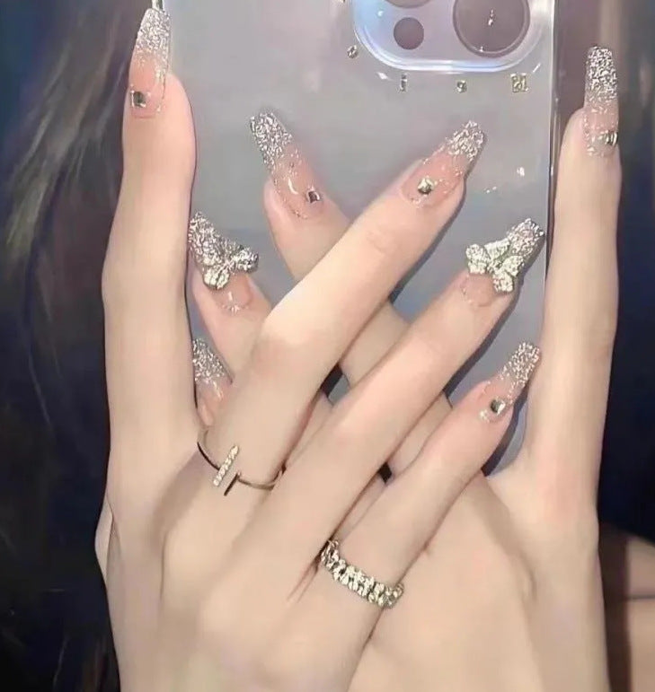 Elegant nail design with pearl embellishment Stornfield