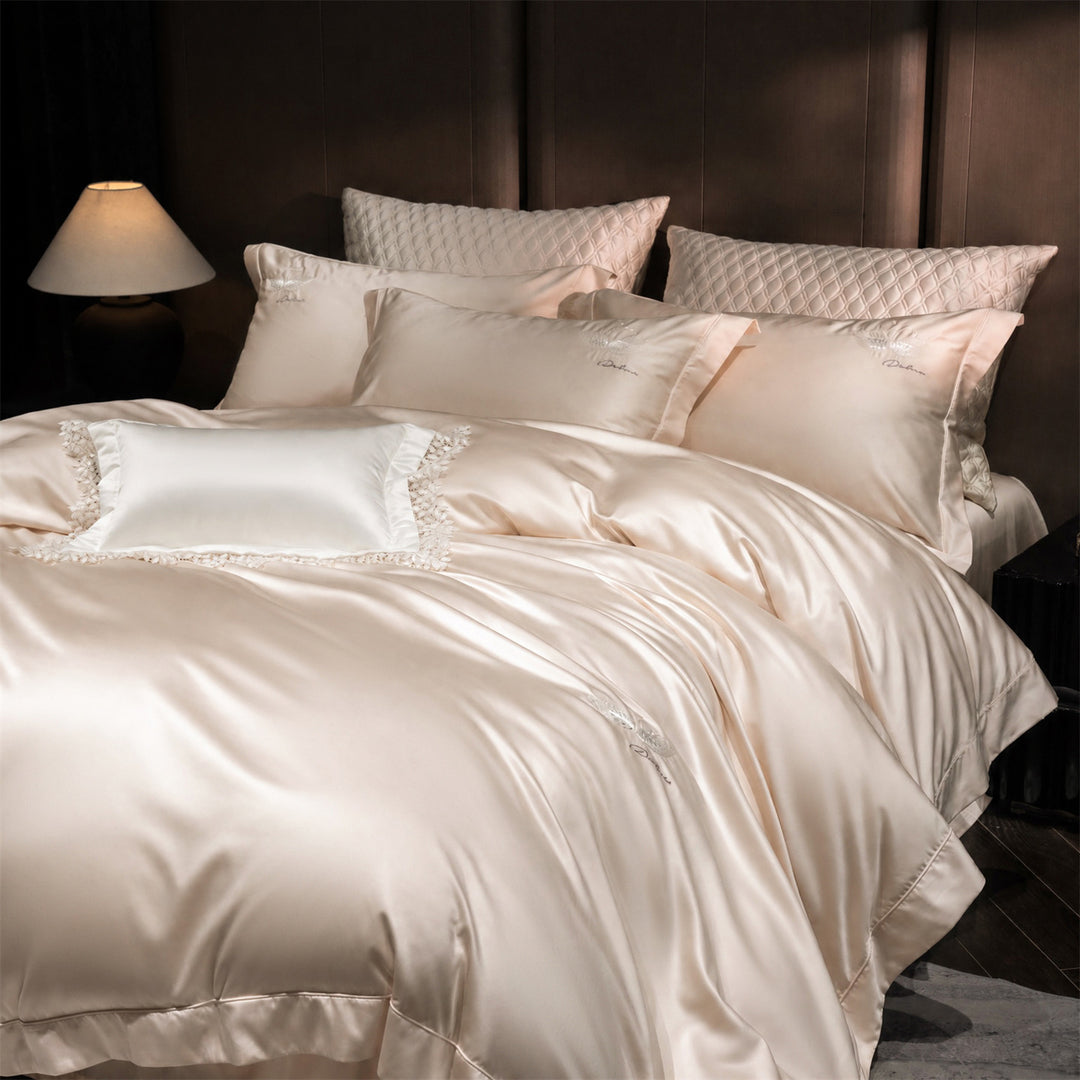 Luxurious satin bedding set with embroidered swan motif and lace pillow