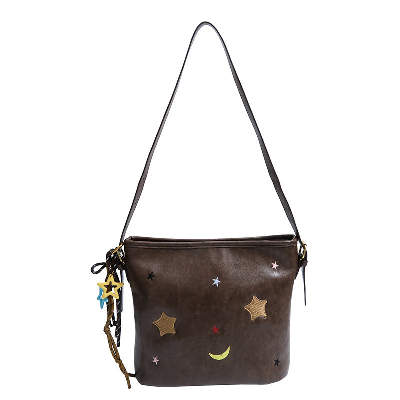 Shoulder bag with charming applications Stornfield