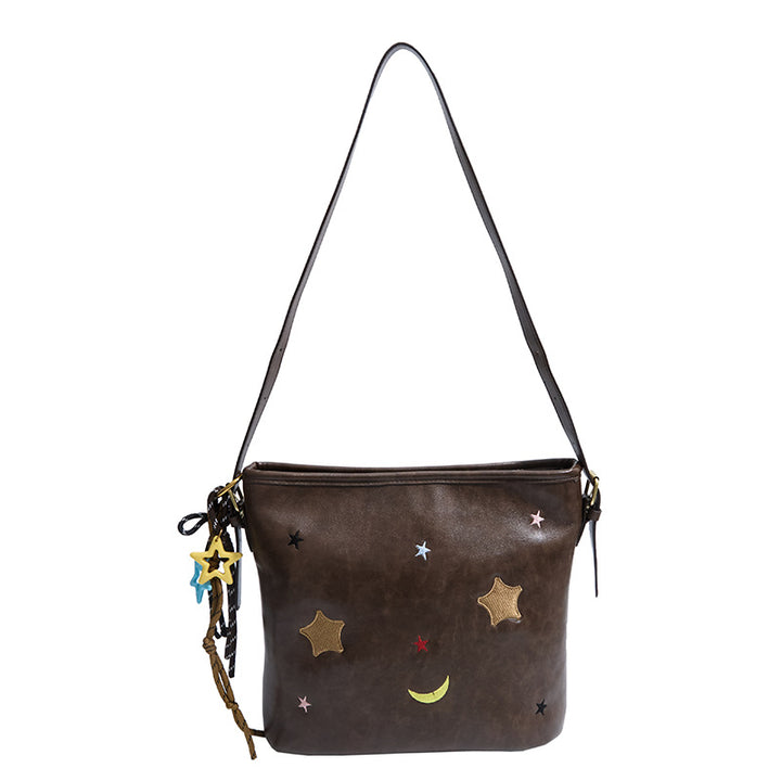 Shoulder bag with charming applications Stornfield