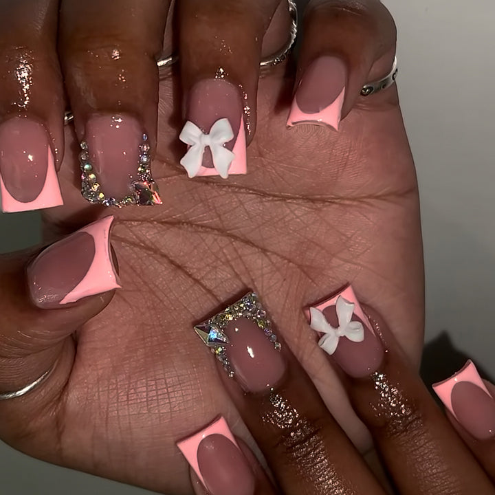 Decorative Acrylic Nail Enhancements with Bow and Rhinestone Accents Stornfield