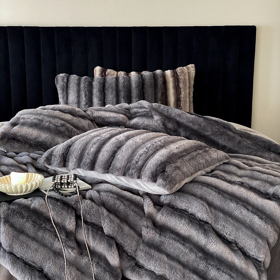 Luxury faux fur blanket with matching ribbed decorative pillow