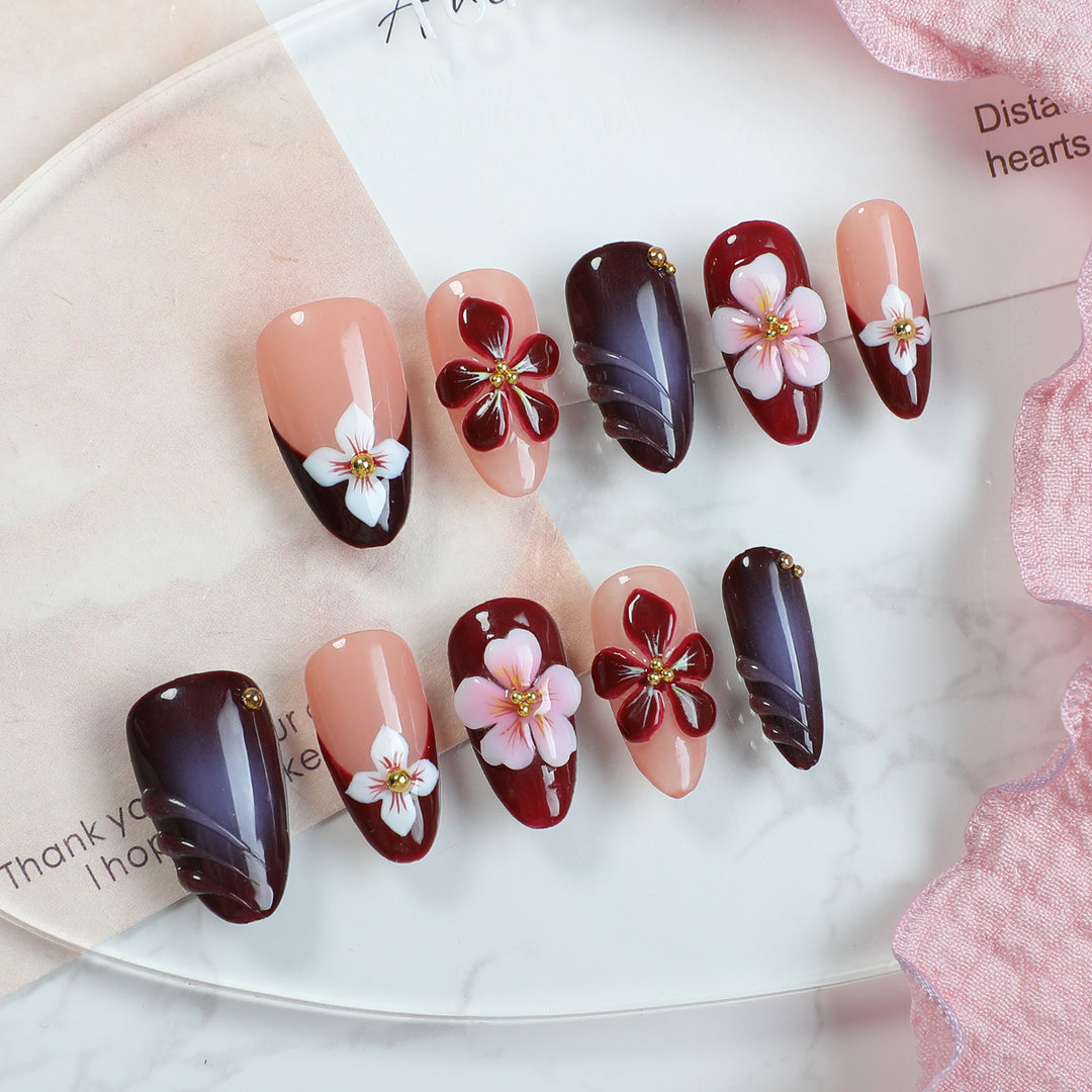 Acrylic nail set with floral accents and luxurious decorations Stornfield