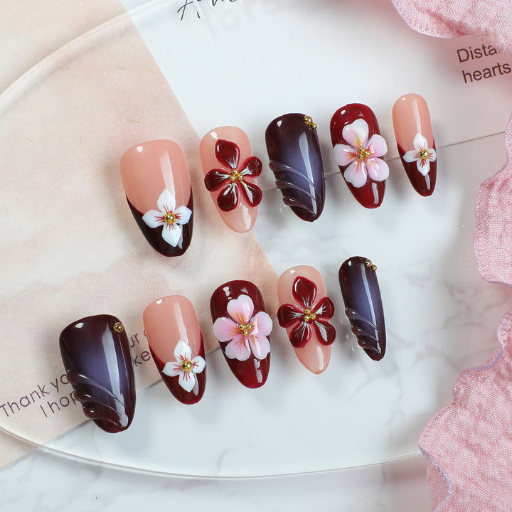 Acrylic nail set with floral accents and luxurious decorations Stornfield