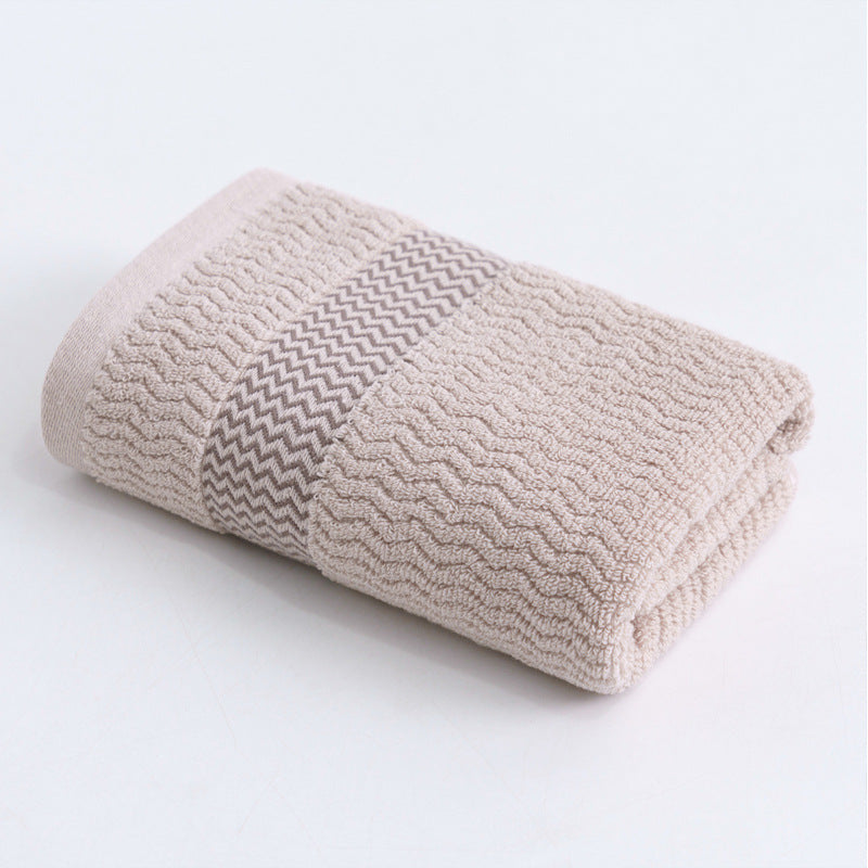 High-quality terry towel with dense pile and decorative zigzag border