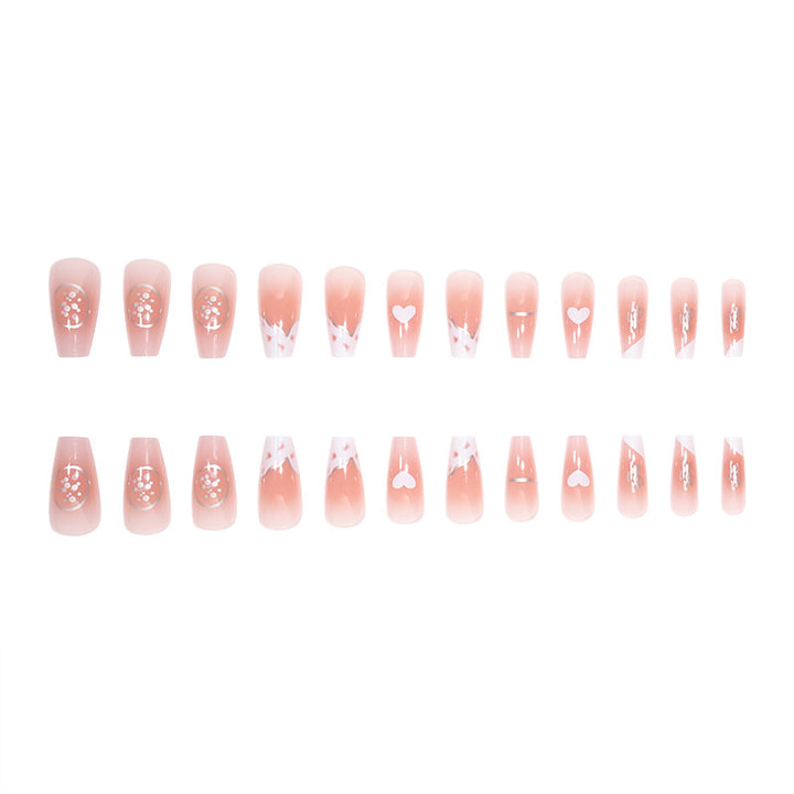 Elegant Long Press-On Nails with Artistic Heart and Gem Accents Stornfield