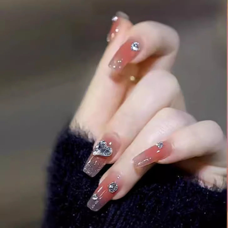 Elegant Nail Art with Glitter and Rhinestones Stornfield