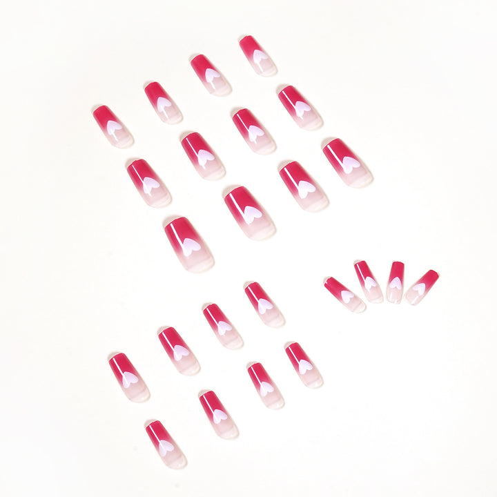 Artful nail extensions in romantic heart design Stornfield