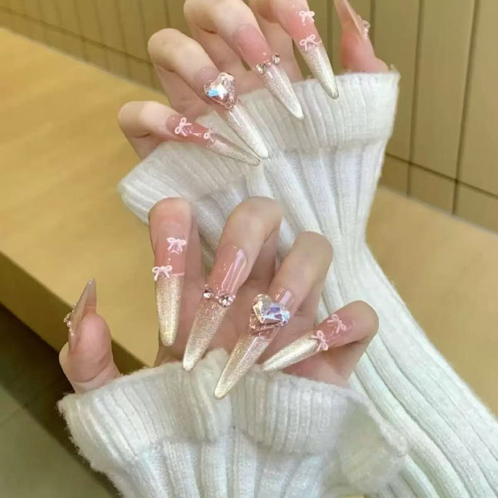 Glamorous artificial nail tips with elegant decorations Stornfield