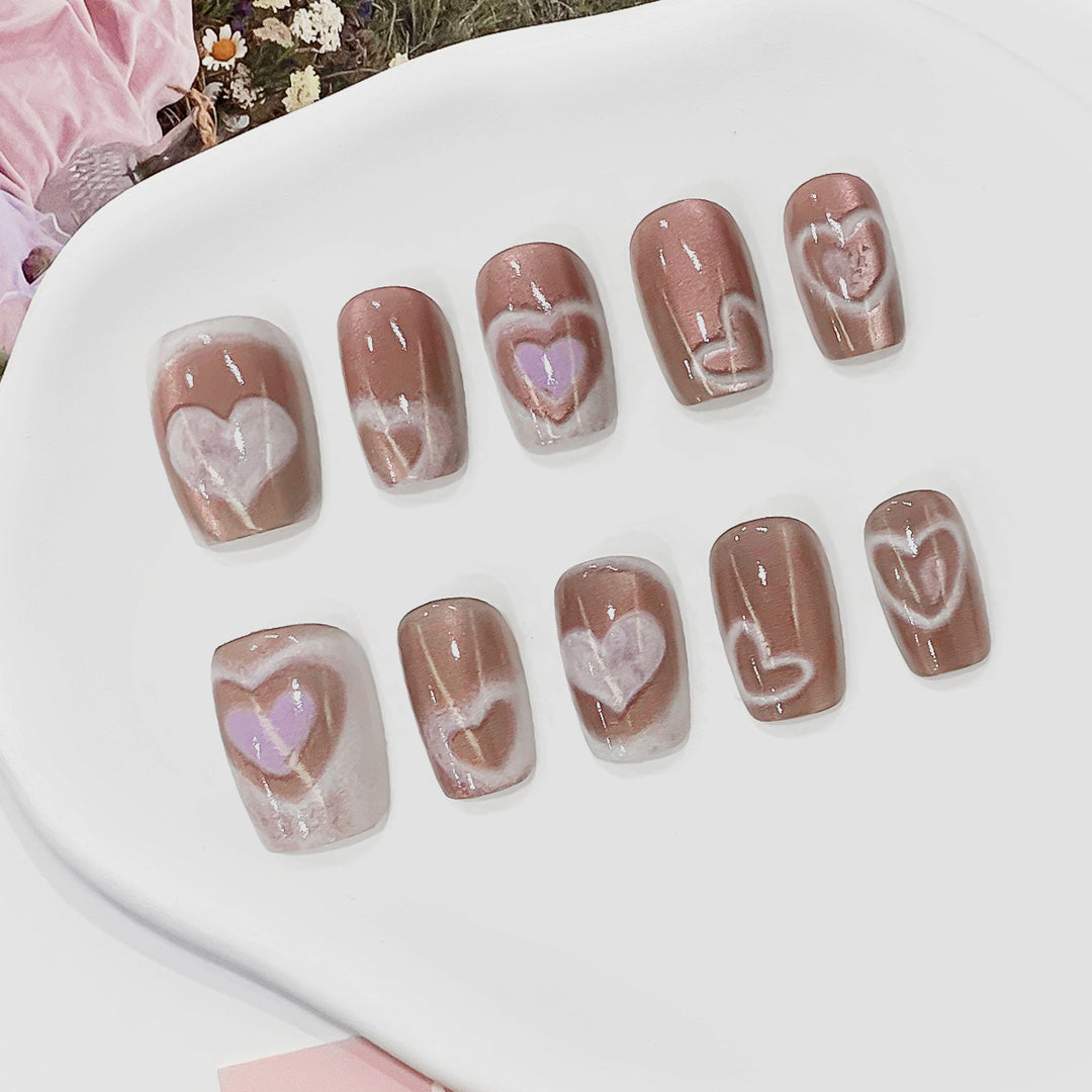 Artificial nail tips in heart design Stornfield