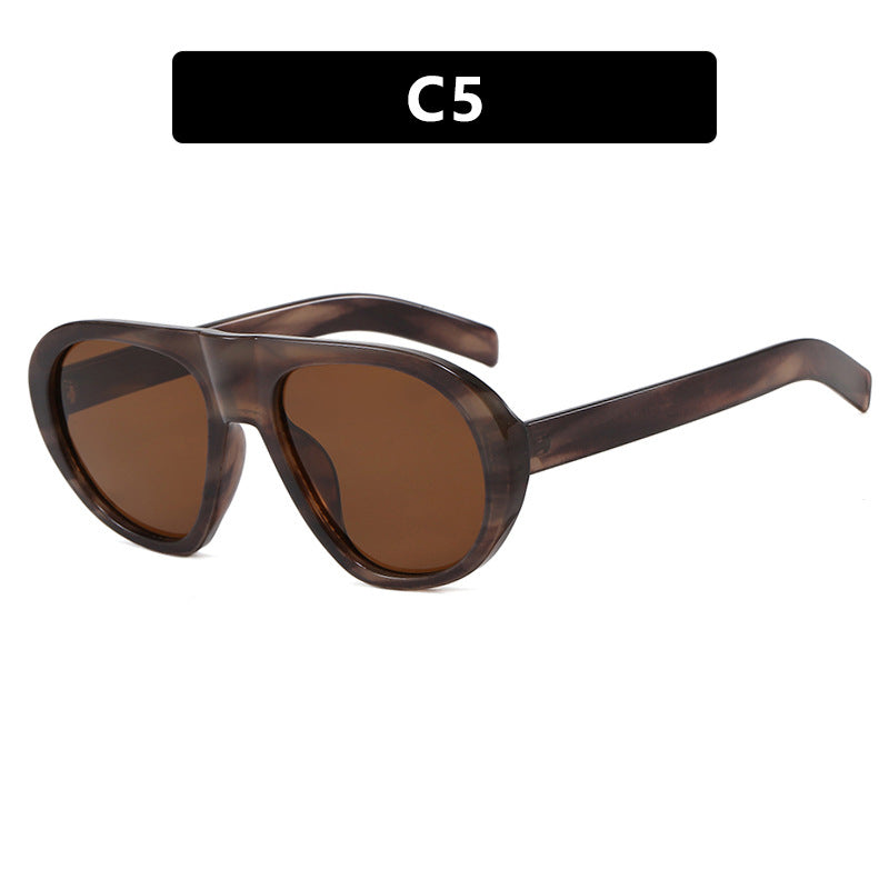 Women striking sunglasses with futuristic frame and sturdy design Stornfield