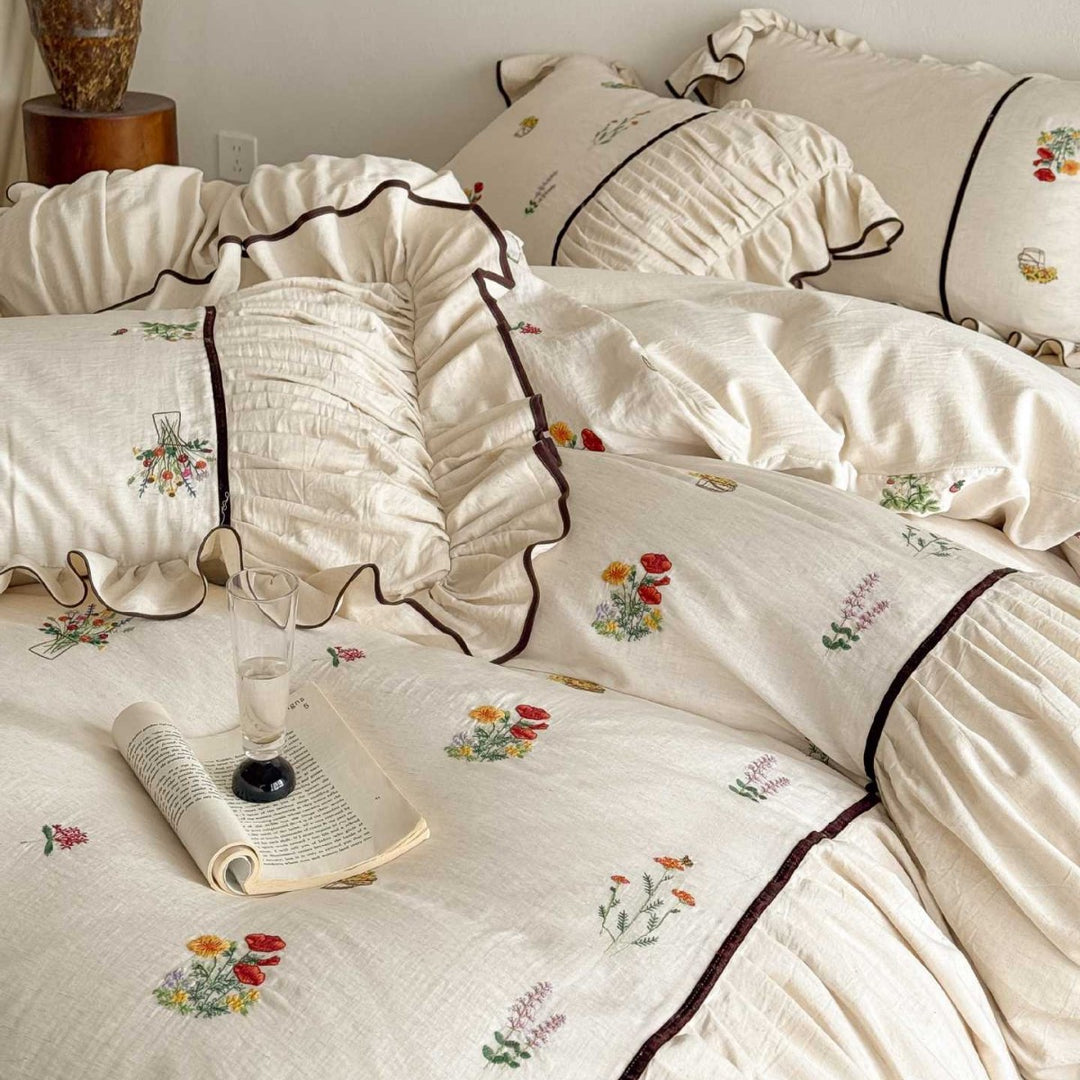 High-quality bed linen set made of linen-cotton blend with wildflower embroidery and ruffled hem