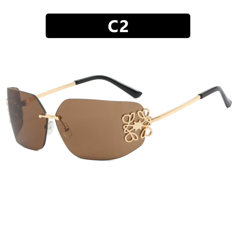 Ladies extravagantly designed sunglasses with elegant embellishments Stornfield