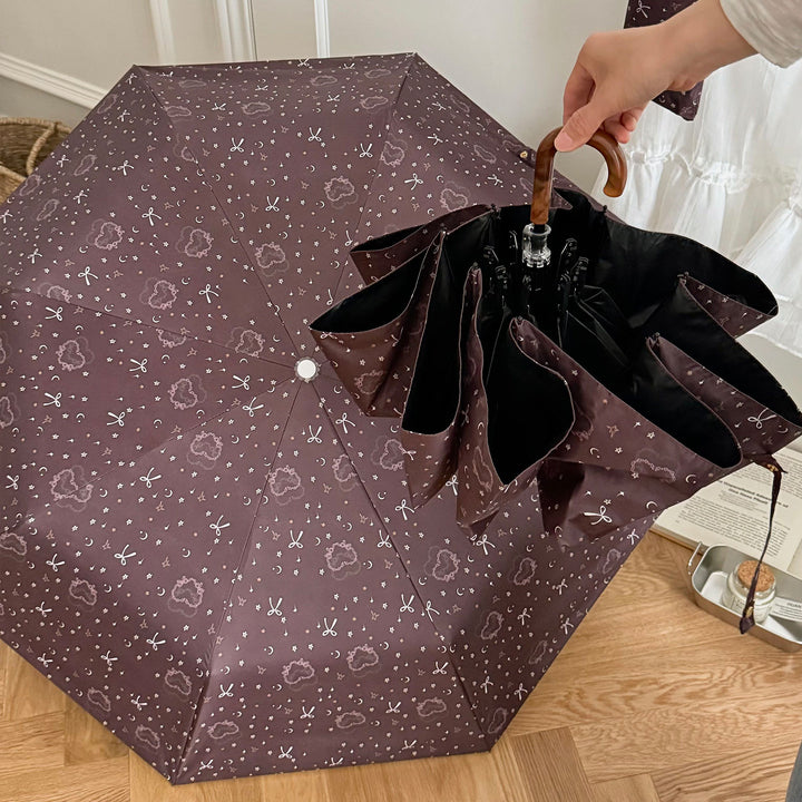 Women's folding umbrella with elegant pendant design Stornfield
