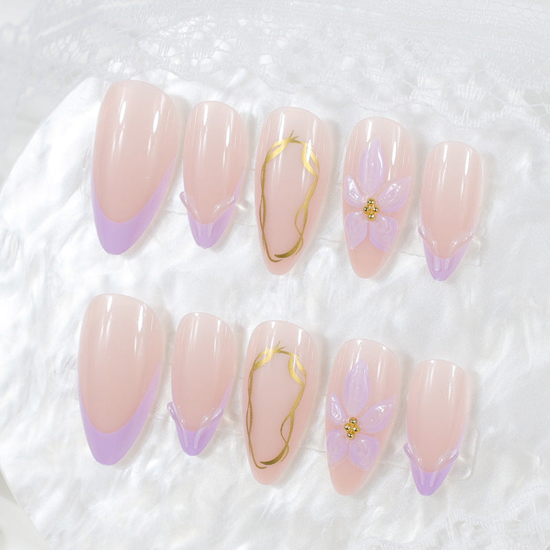 Artificial nail set with delicate floral decorations and elegant shine Stornfield