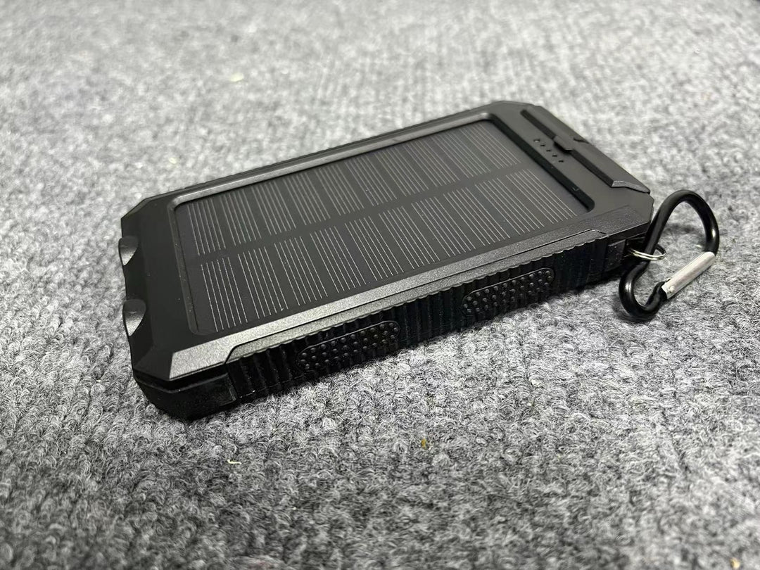 Portable solar power bank with integrated charging plug function Stornfield