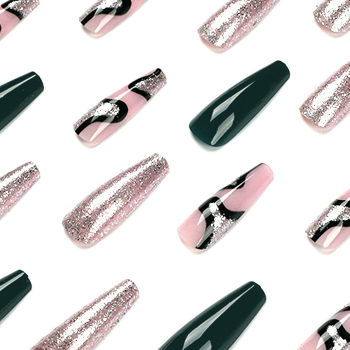 Artificial nail art with elegant glitter and gradient effects Stornfield