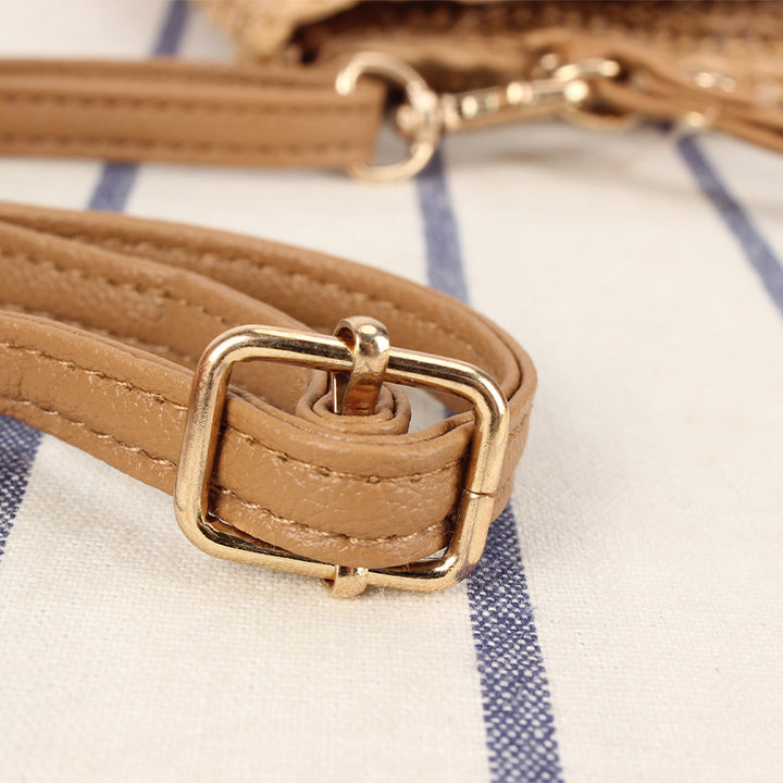 Shoulder bag made of braided straw with structured design Stornfield