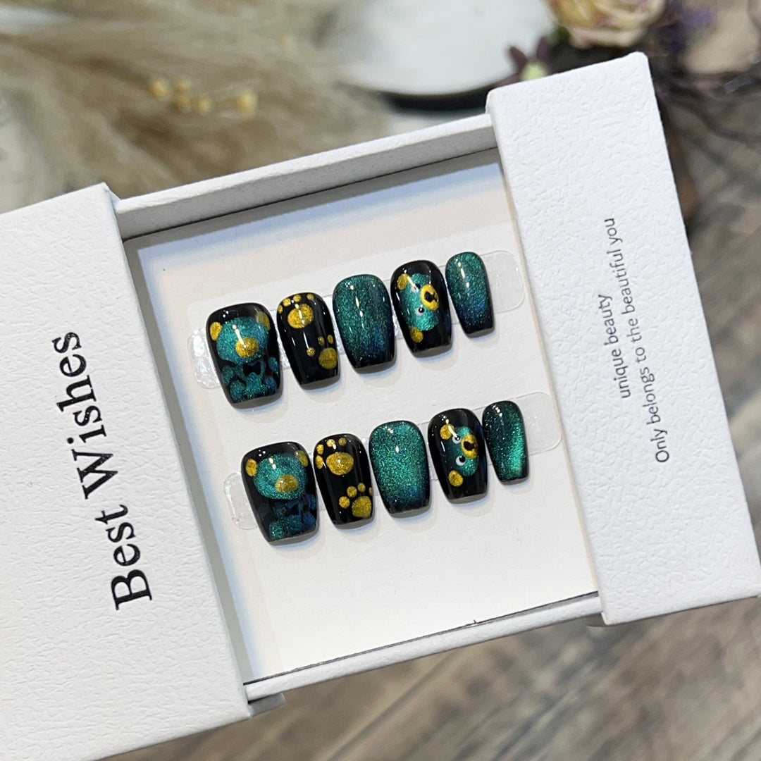 Artistic Press-On Nail Set with Playful Floral and Glitter Accents Stornfield