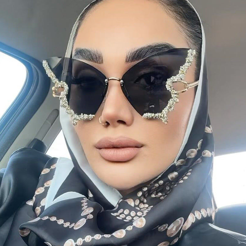 Women's large cat-eye sunglasses with sparkling rhinestone embellishment and elegant frame Stornfield