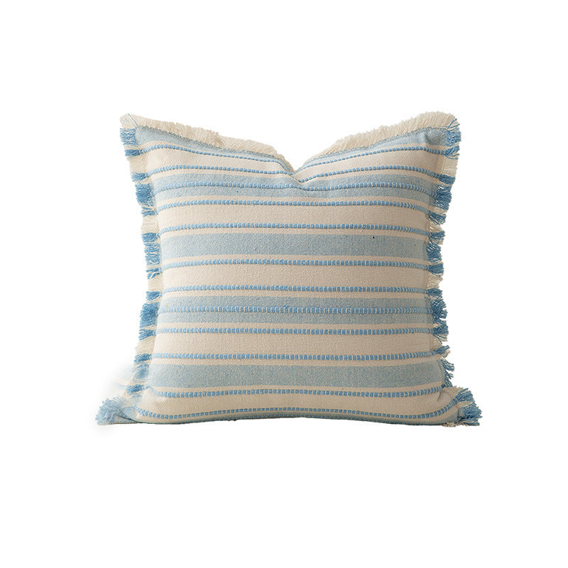 Square cushion cover made of hand-woven cotton blend with decorative fringe trim Stornfield