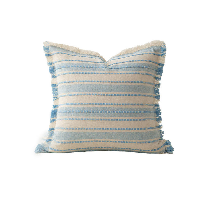 Square cushion cover made of hand-woven cotton blend with decorative fringe trim Stornfield