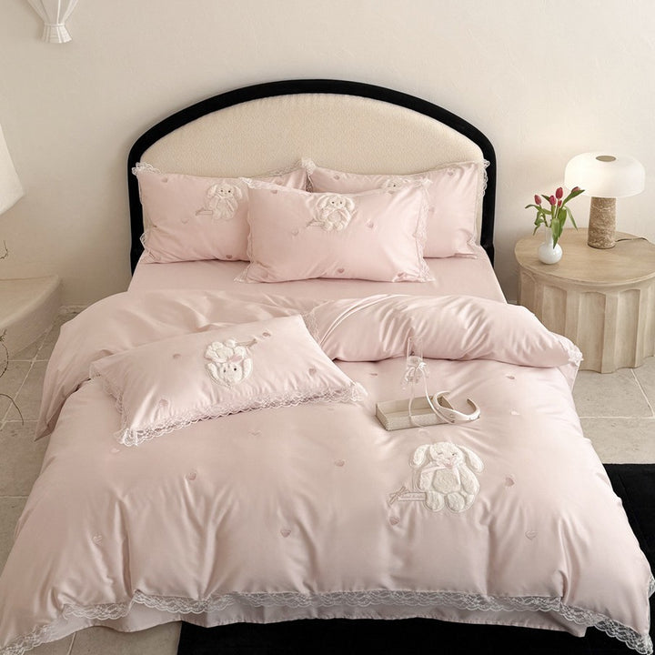 Luxurious bedding set made of cotton satin with embroidered plush bunny and lace trim