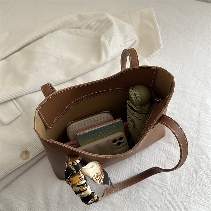 Elegant Structured Tote Handbag with Decorative Scarf