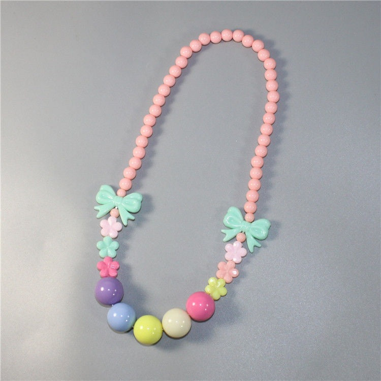 Colorful pearl necklace with floral elements Stornfield