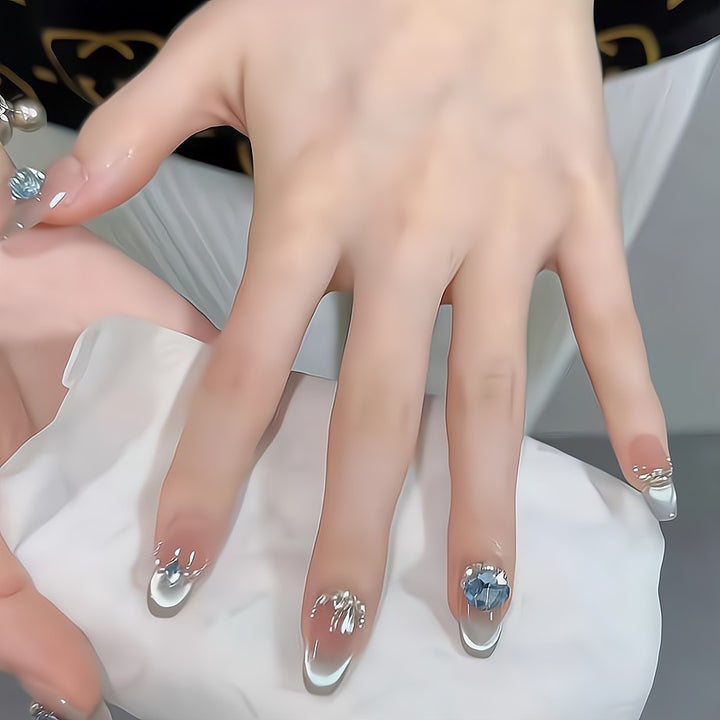 Glittering artificial nails with rhinestones Stornfield