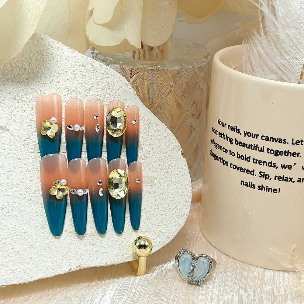 Glamorous artificial nails with elegant ombre effect and high-quality embellishments Stornfield