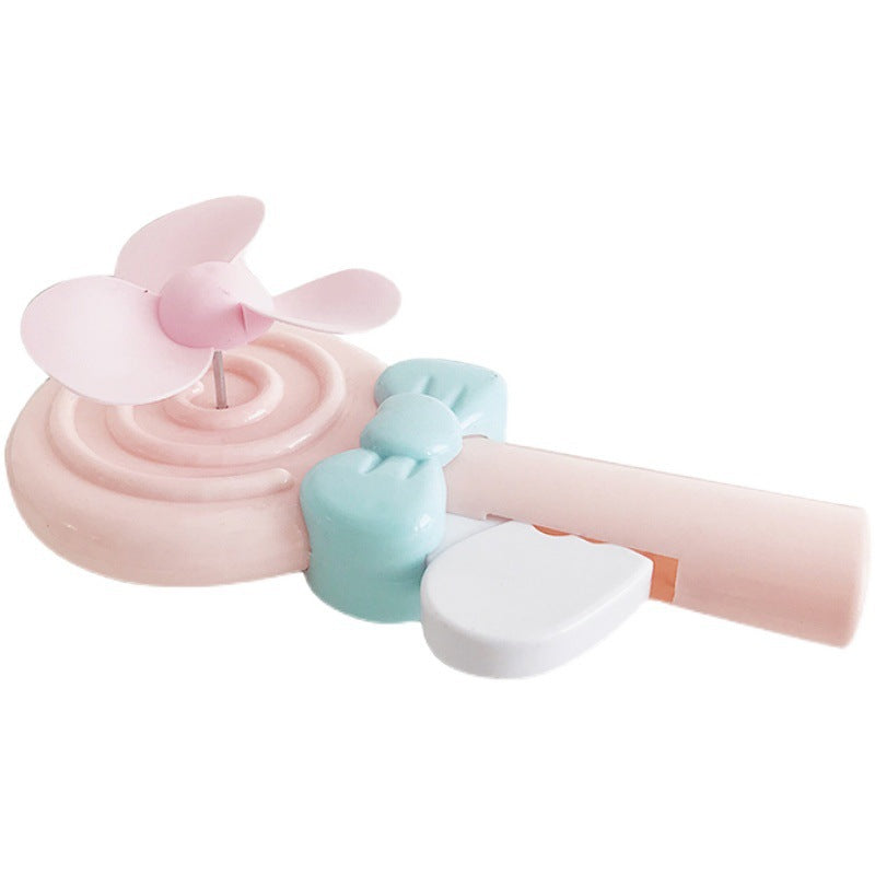 Portable hand fan for women in lollipop design Stornfield