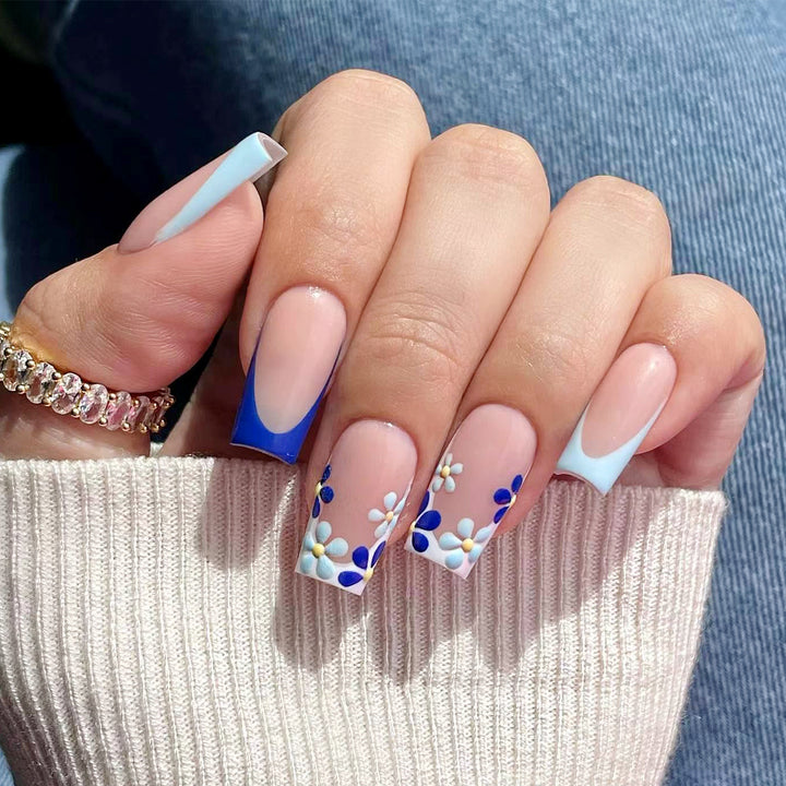 Artistic nail design with floral accents Stornfield