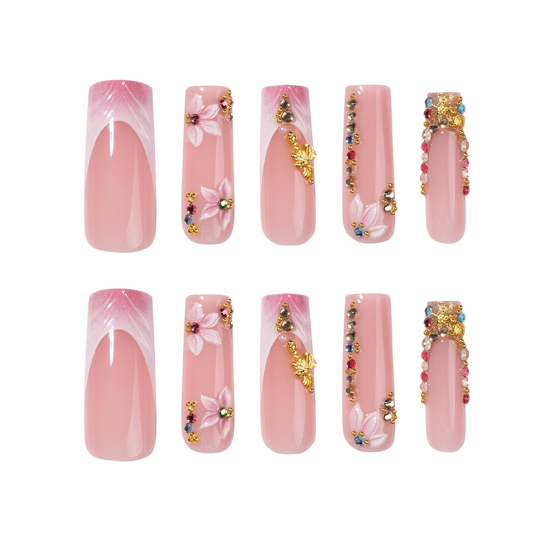 Artistic Nail Extensions with Rhinestone and Flower Embellishments Stornfield